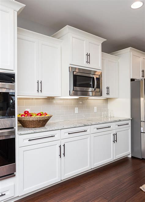 bodyn offwhite cabinets with stainless steel handles|kitchen cabinets white hardware.